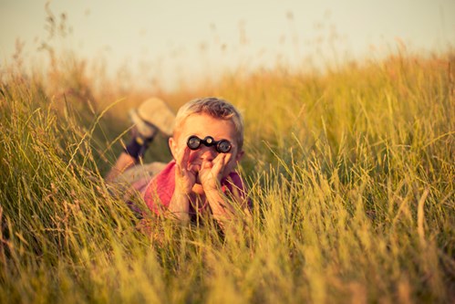 child with binoculars