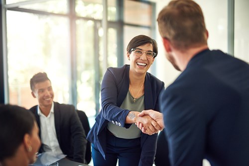 shaking hands in meeting