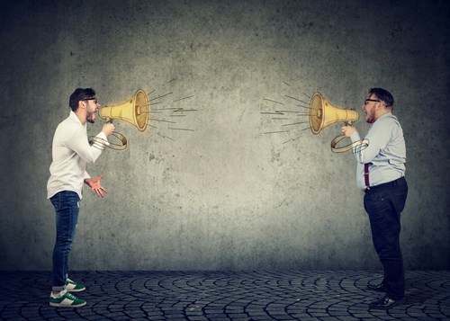 two men megaphone shouting