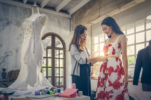 woman dress fitting