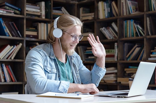 male student working remotely