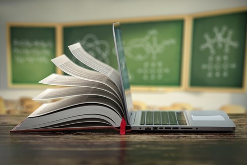 laptop and book